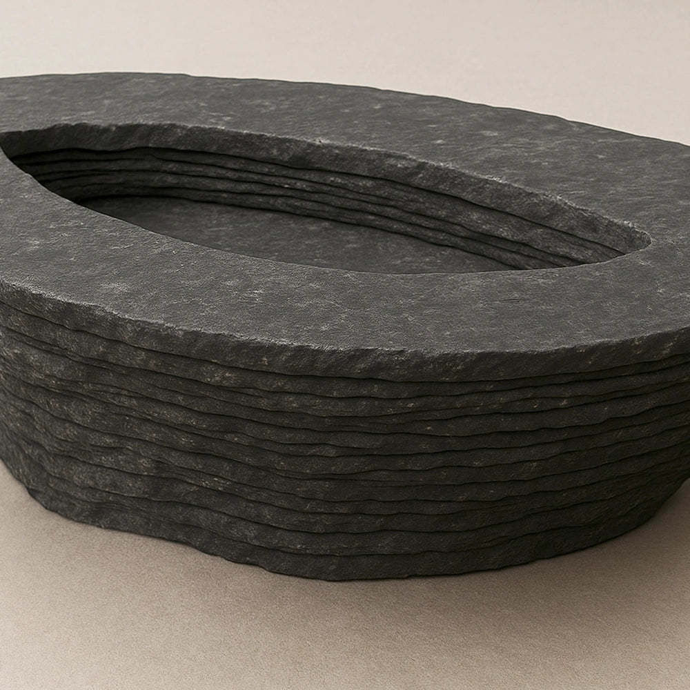 Close-up of the central opening and layered black marble texture of the Einros Coffee Table.