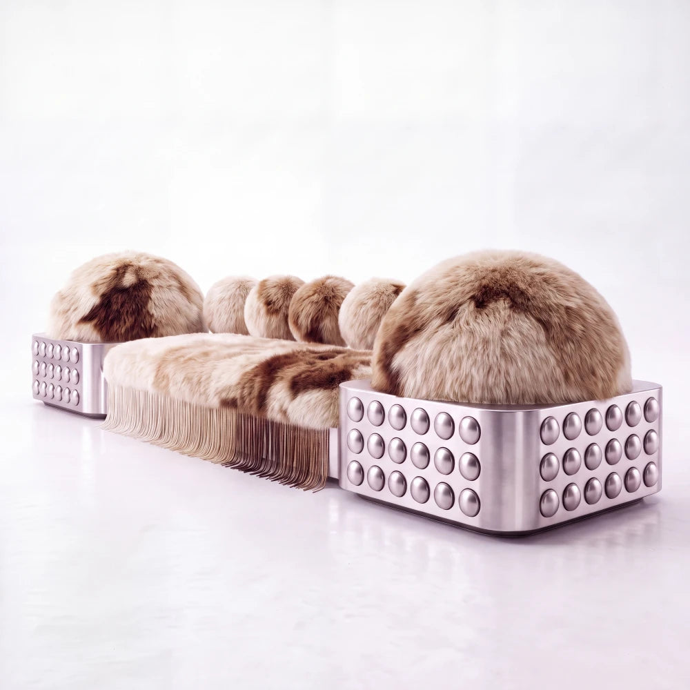 Three-quarter view of the Moonage sofa by Diamant Versatile, highlighting its gradient fur cushions, long fringe and studded metallic structure.
