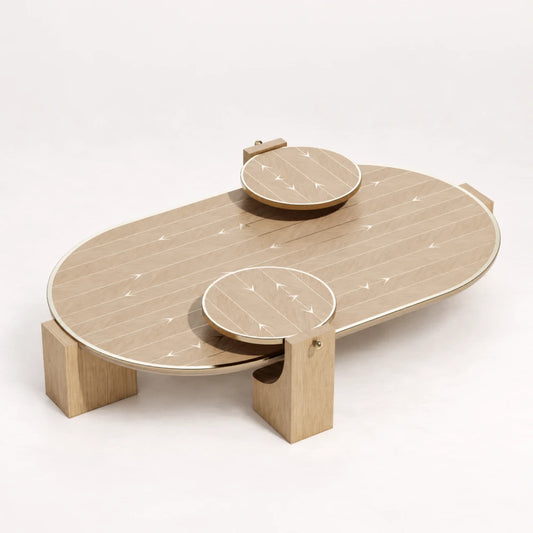 CT02 Coffee Table from the X Collection by Eva Szumilas in natural oak, with two raised circular platforms, pale arrow inlays and wooden block supports.