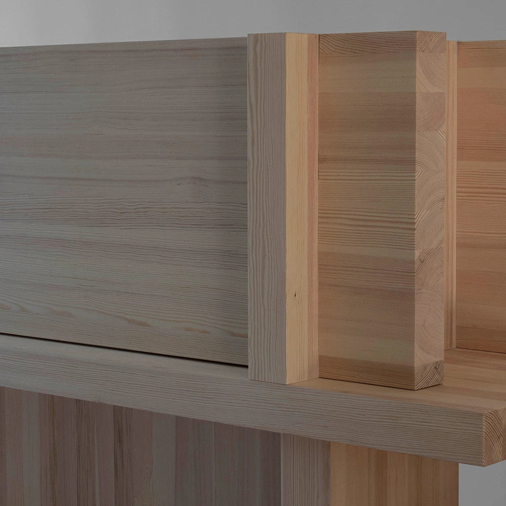 Close-up of the Itooraba Sideboard Natural by Sizar Alexis, highlighting its projecting door, Swedish pine grain and geometric construction.