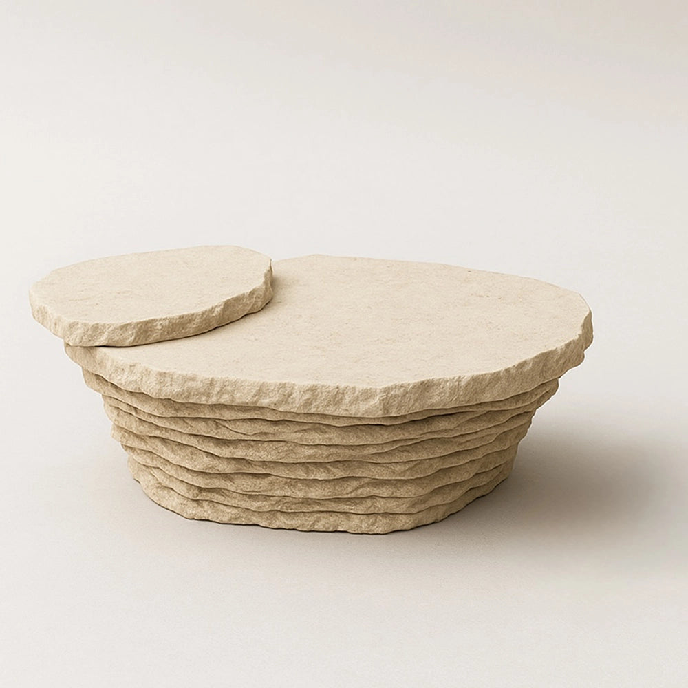 Aeon travertine coffee table by Andres Monnier with an organic top and stacked, irregular stone base.