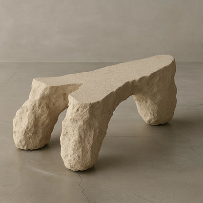 Davido travertine coffee table by Andres Monnier with an asymmetrical top and three sculpted legs.