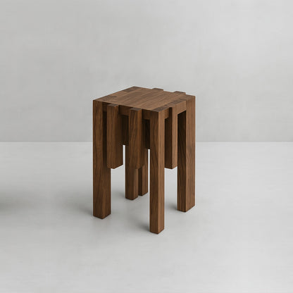 Ordo oak side table by Andres Monnier with a square top supported by repeated vertical elements.