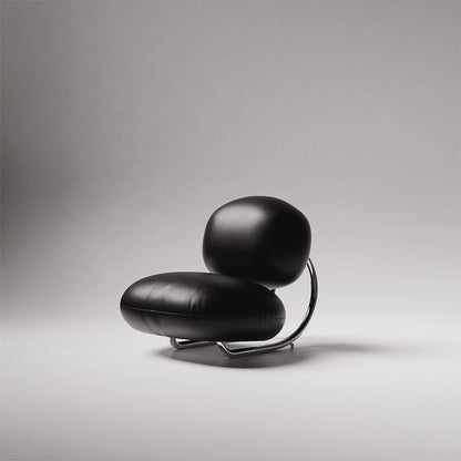 C8 Armchair in black leather and polished chrome by Antony Gasnier, shown from a three-quarter front view