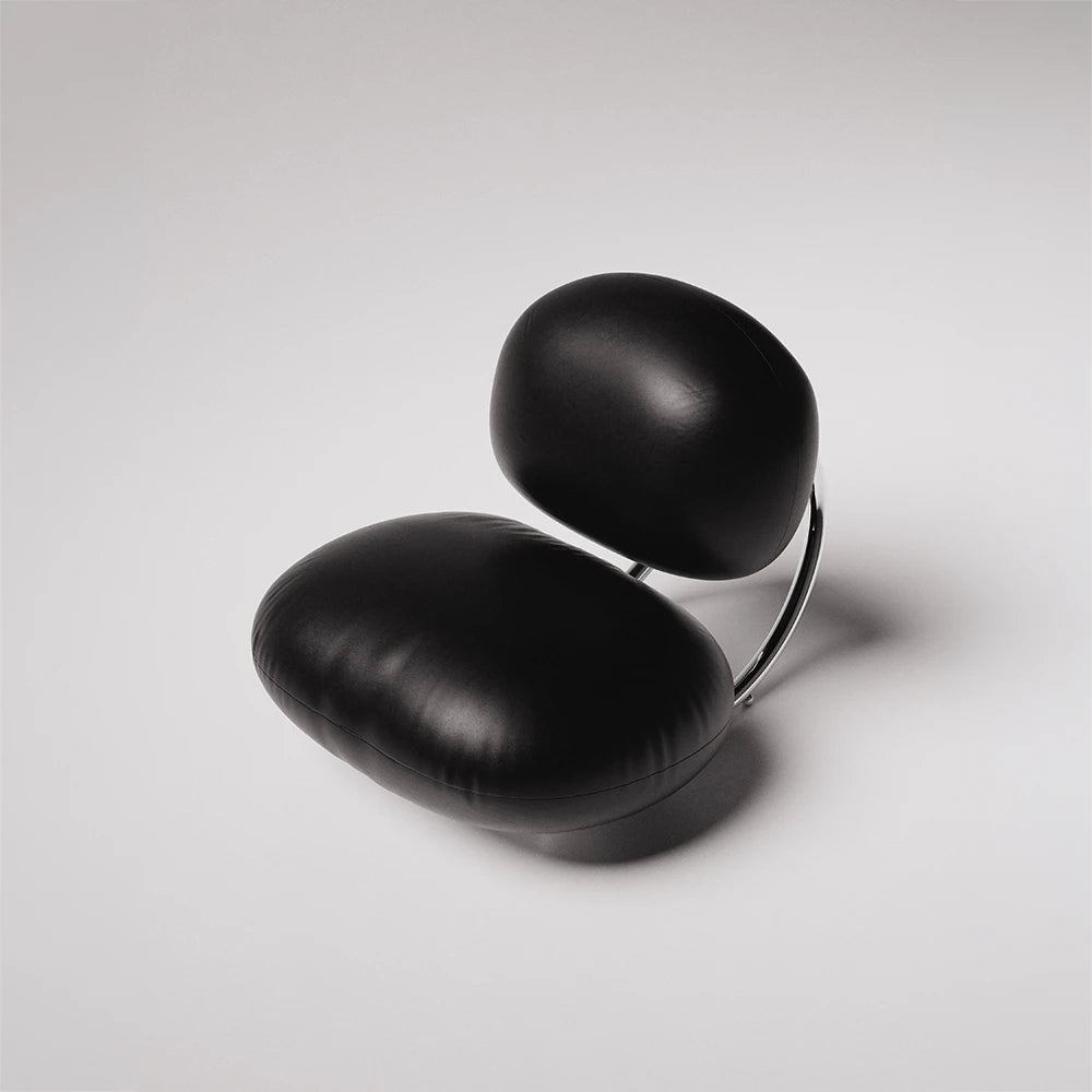 Top view of the C8 Armchair by Antony Gasnier with two rounded black leather cushions and polished chrome supports