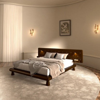 Will Bed in dark wood by Antony Gasnier, displayed in an elegant bedroom with integrated bedside tables and reading lights