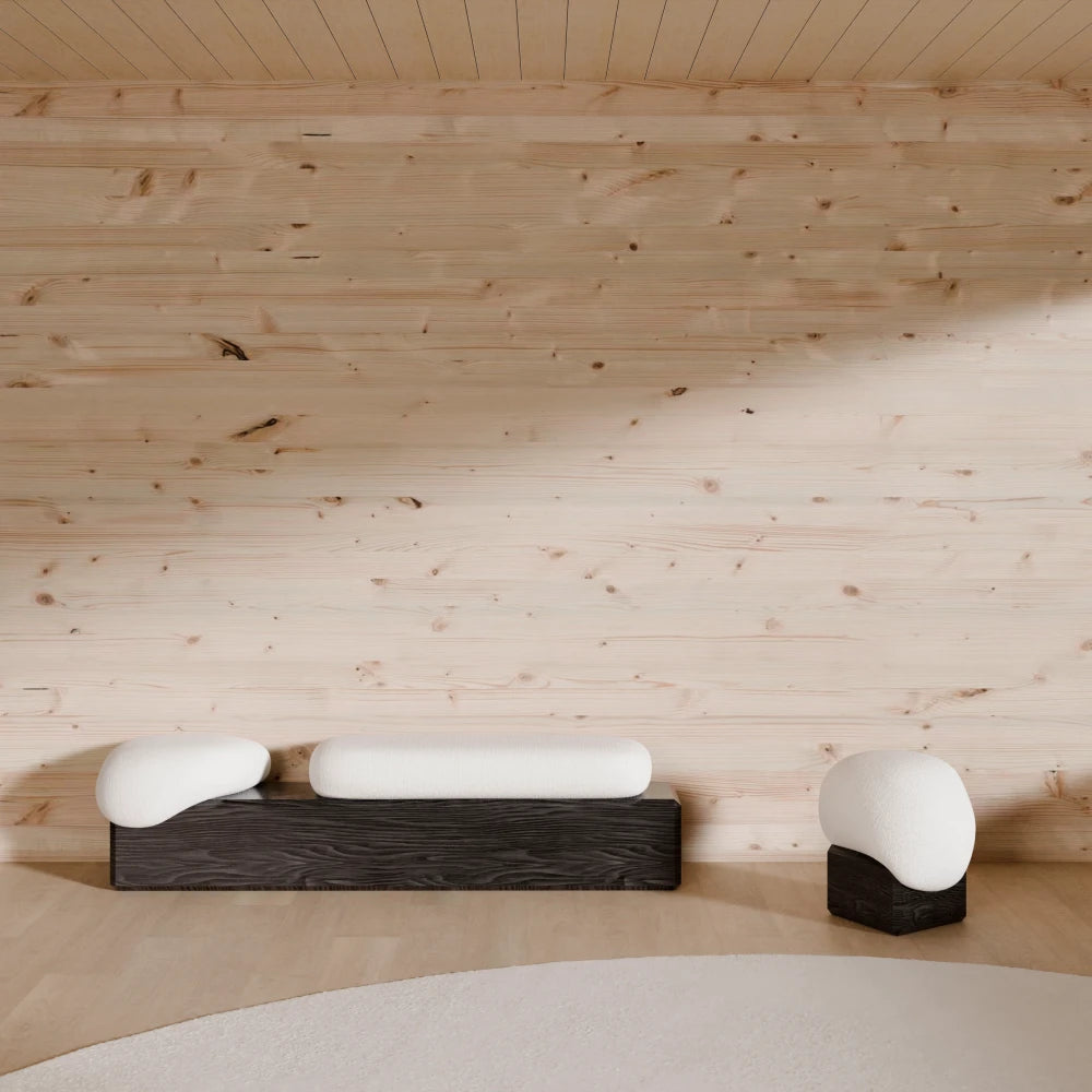 Winter Bench and matching ottoman by Antony Gasnier displayed in a contemporary wood-panelled interior