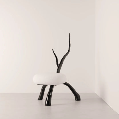 Winter Branch Chair in dark solid oak and white fabric by Antony Gasnier, front view highlighting its branch-shaped backrest