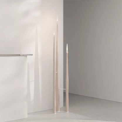 Full view of the Winter Candle set by Antony Gasnier with three slender light wood candle holders