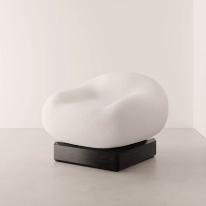 Winter Powder Chair in white fabric and solid oak by Antony Gasnier, shown from a three-quarter front view