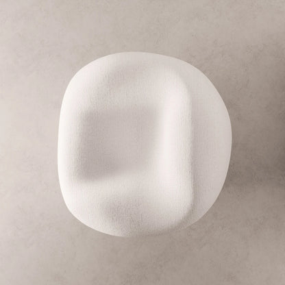 High-angle view of the Winter Powder Chair by Antony Gasnier, showing its sculpted seat and enveloping curved form
