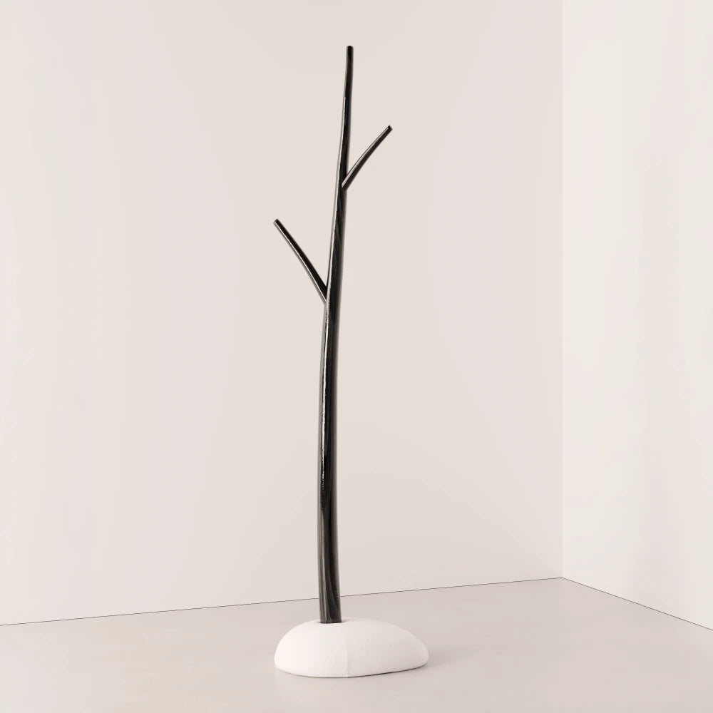 Winter Tree coat stand in dark wood by Antony Gasnier with three branches and a rounded white upholstered base