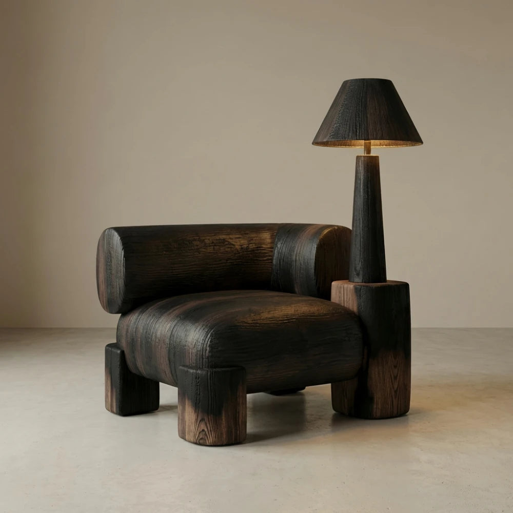 Lamp Assise I armchair by Diamant Versatile, with a dark wooden seat, cylindrical armrests and an integrated lamp.