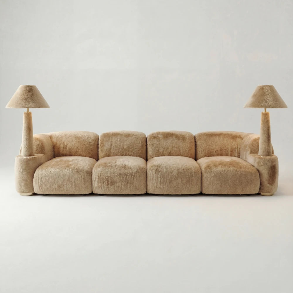 Front view of the Lamp Assise sofa by Diamant Versatile, with four cream upholstered seats and lamps at both ends.