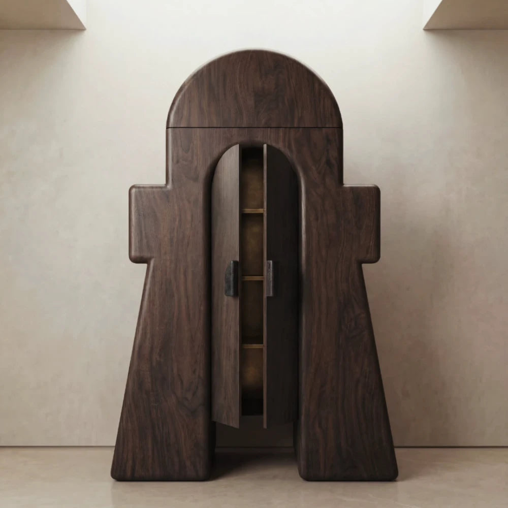 Full front view of the sculptural Le Gardien cabinet by Diamant Versatile with its central doors slightly open.