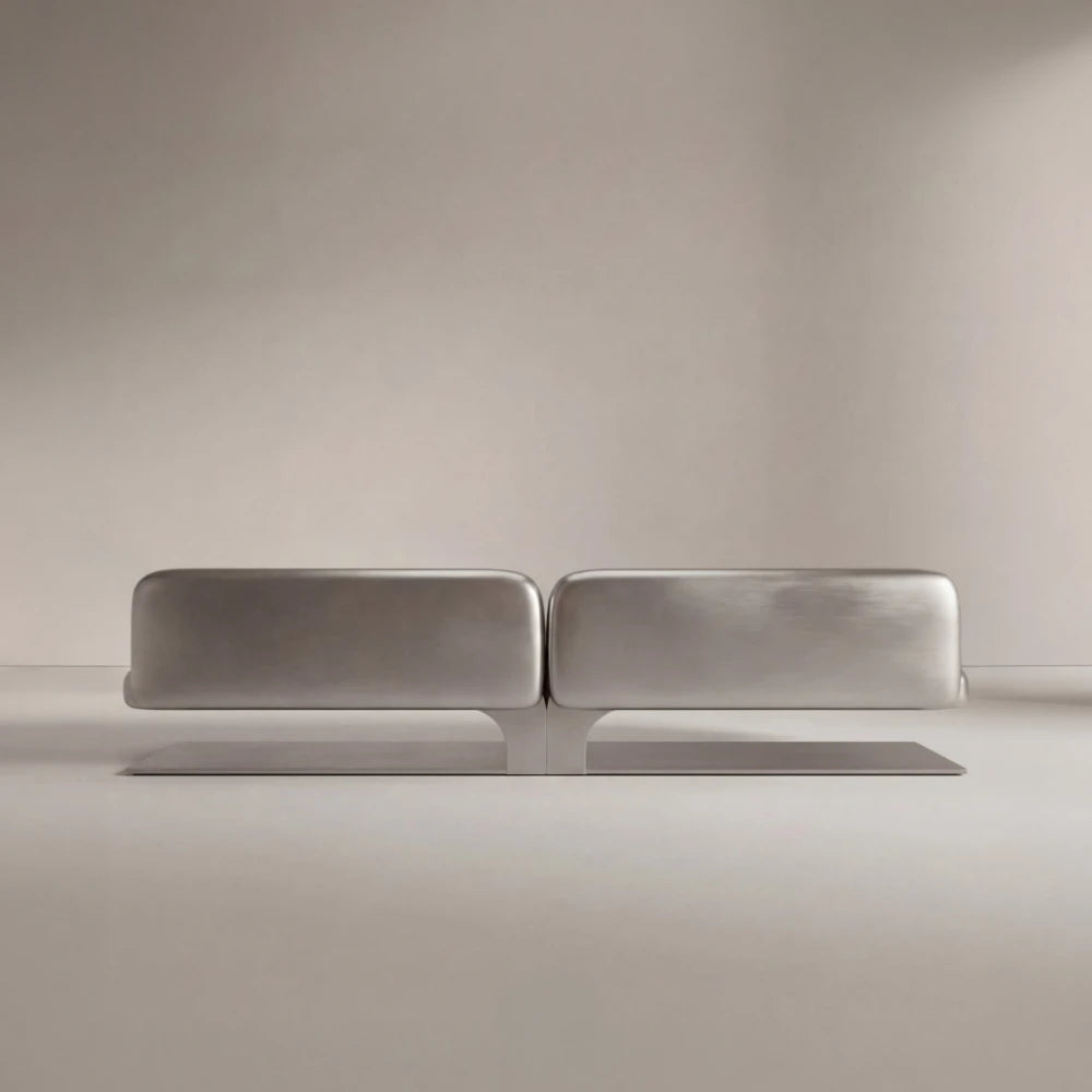 Rear view of the Confluence bench by Diamant Versatile, showing its symmetrical brushed metal backrests and extended base.
