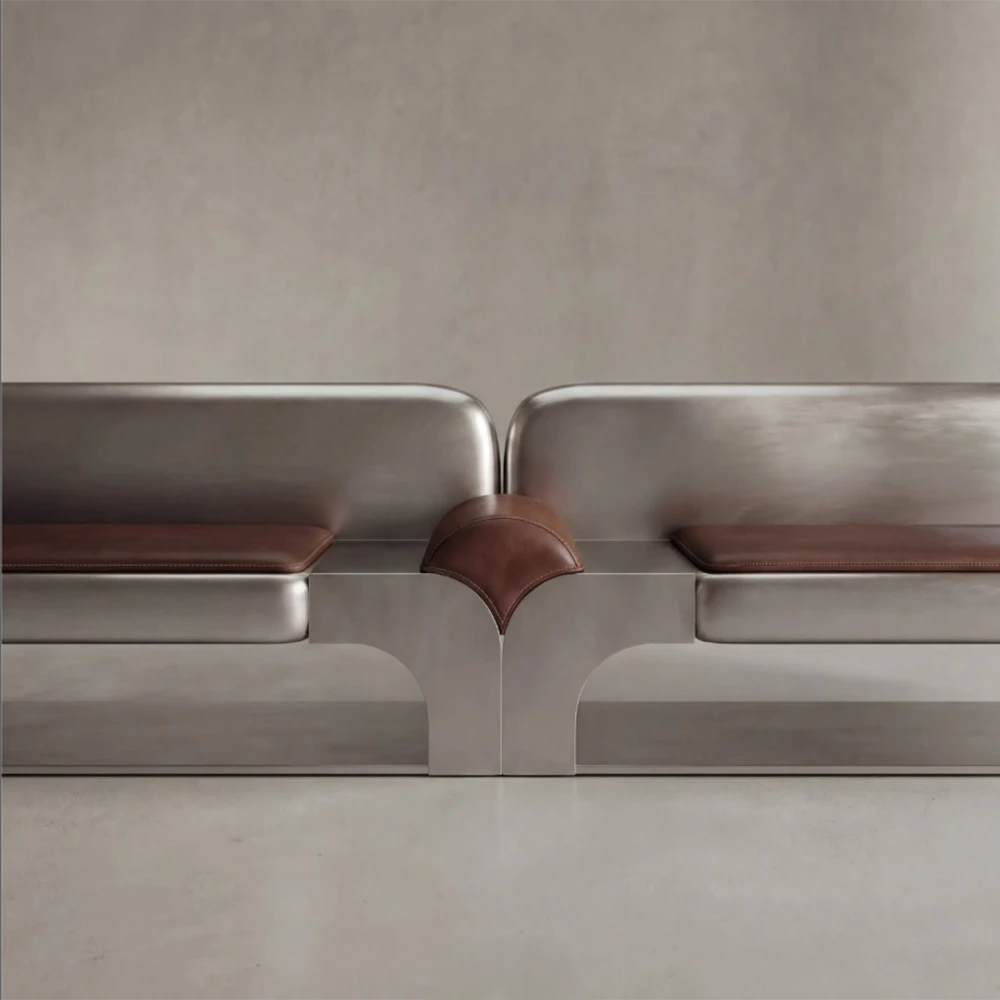 Front detail of the Confluence bench, highlighting its two seats, brown leather cushions and central upholstered element.