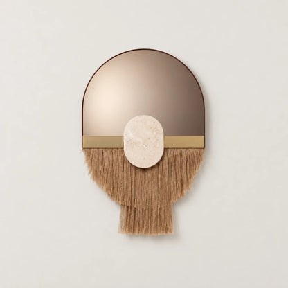 Souk Ecru Mirror by Dooq Details, with an arched bronze-toned mirror, oval stone ornament and curved tan fringe extending into a rectangular central panel.