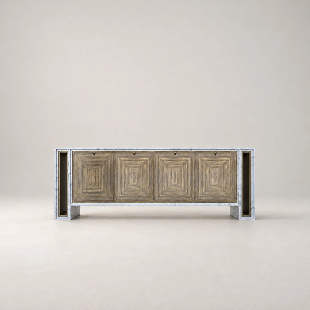 Front view of the BB04 Sideboard by Eva Szumilas, showing concentric rectangular patterns on four brass doors framed by white veined marble.
