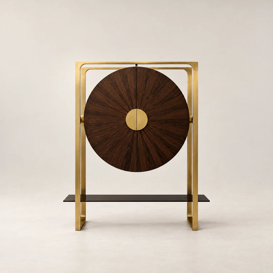 Front view of the Gong Bar Cabinet by Eva Szumilas, with circular wooden doors, radiating grain, central gold-toned handles and a rectangular metal frame.