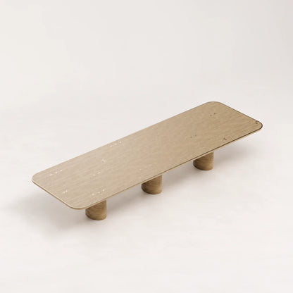 DT01 Dining Table from the X Collection by Eva Szumilas in natural oak, with a rounded rectangular top, fine linear inlays and three cylindrical legs.