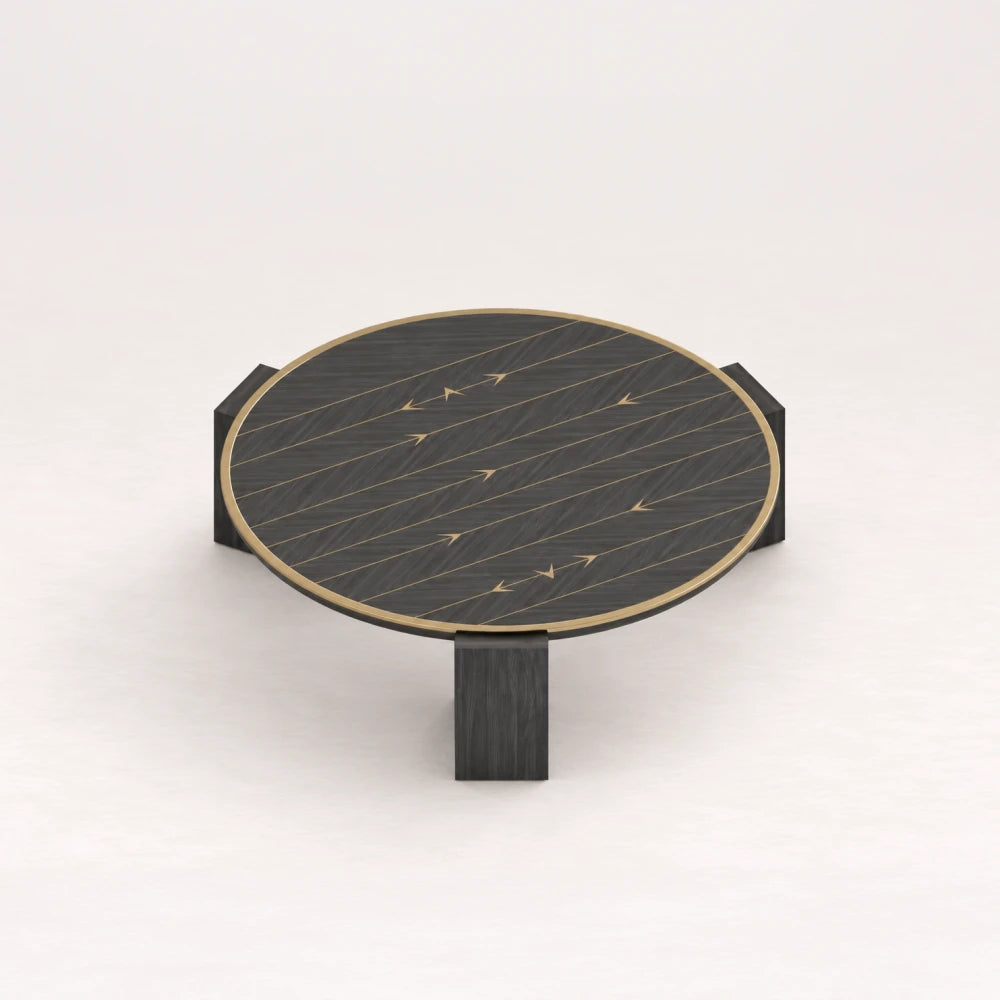 CT01 Coffee Table from the X Collection by Eva Szumilas in black wood, with a round top, gold-toned rim, linear inlays and three block legs.