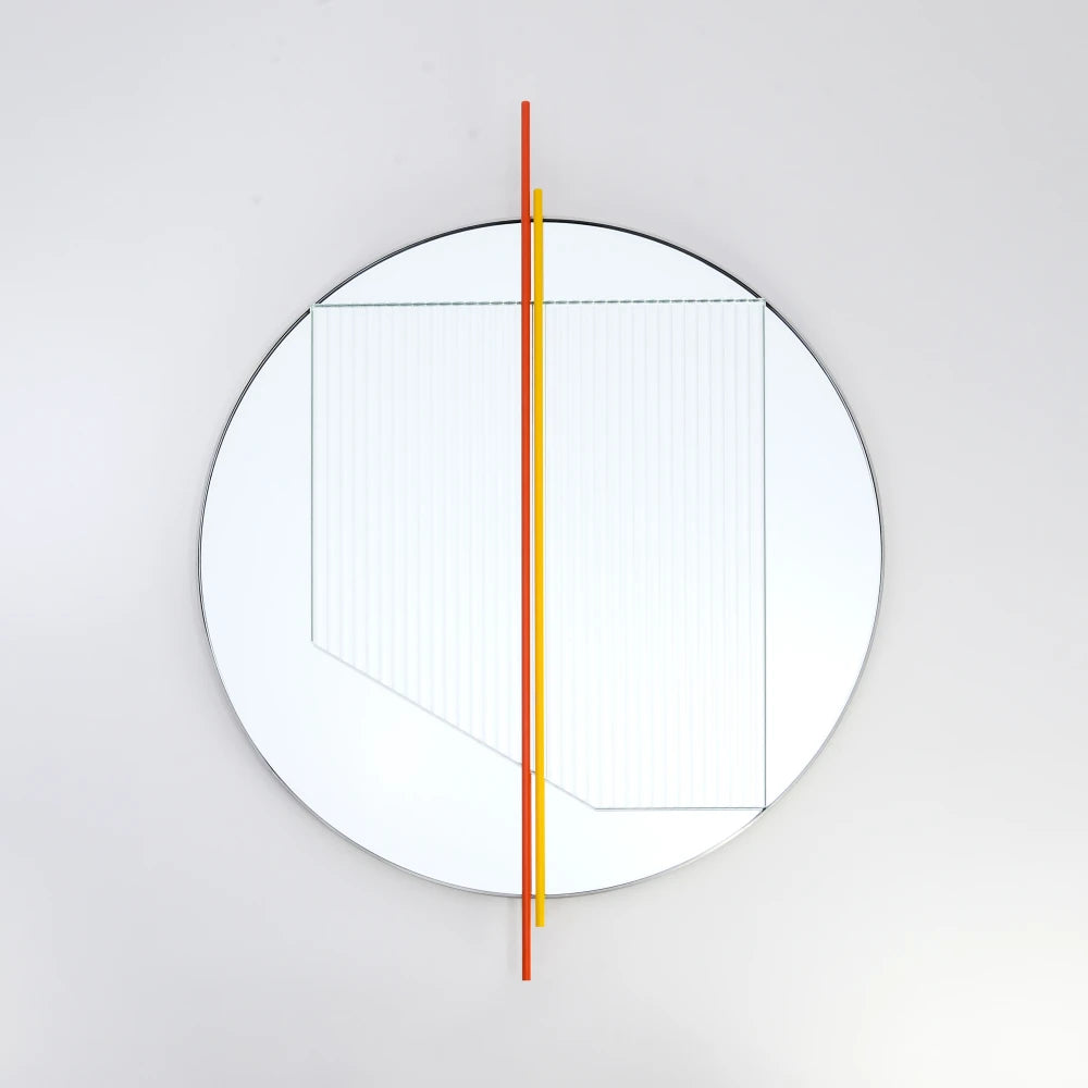 Front view of the small Claude Mirror by Garnier Pingree, showing red-orange and yellow vertical rods and an angular ribbed glass overlay.