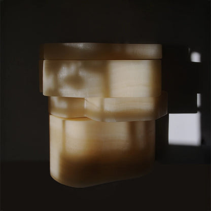 Front view of the closed White Moth Nightstand by Panorammma illuminated by direct sunlight