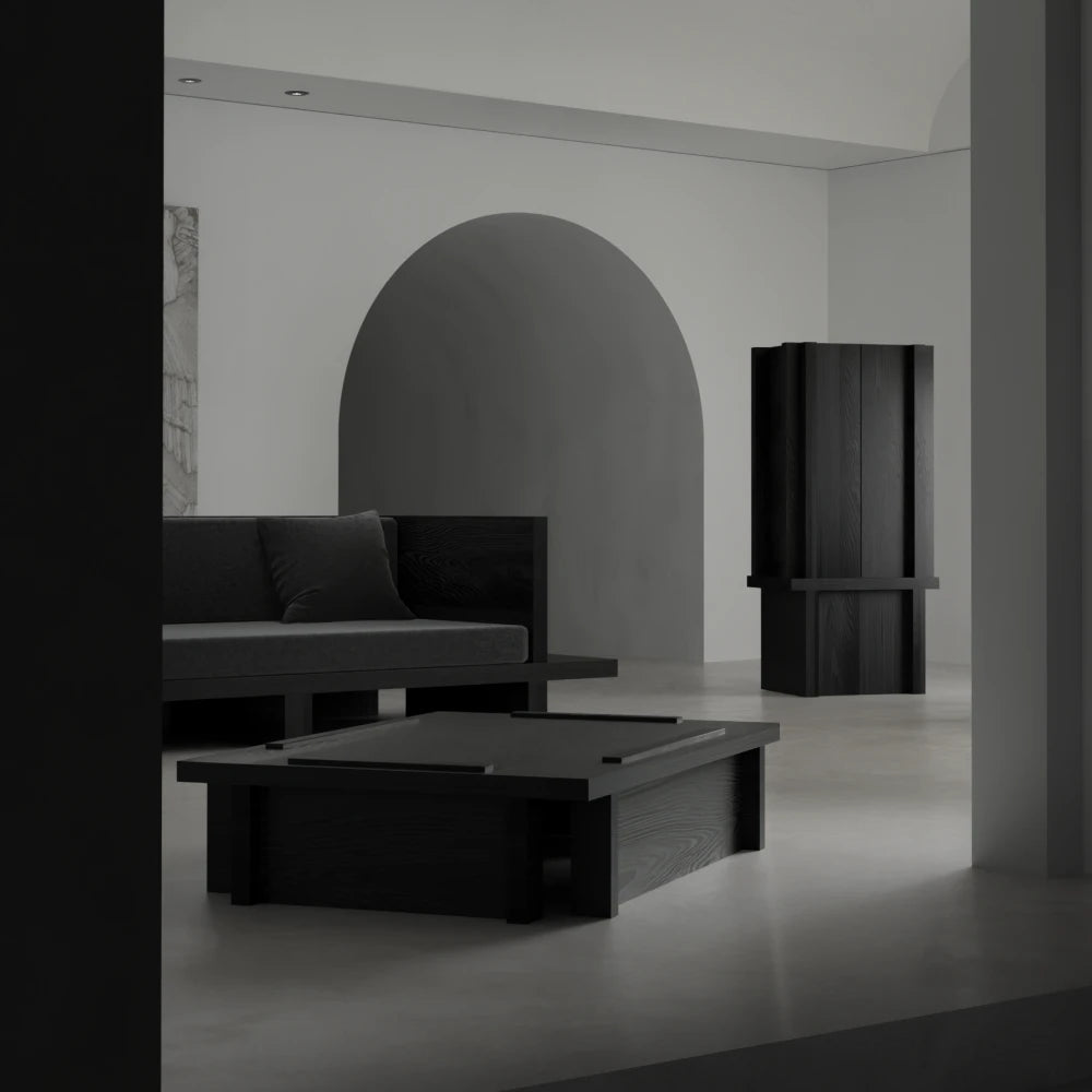 Itooraba Cabinet by Sizar Alexis displayed in a minimalist interior, featuring a tall black pine structure with strong architectural lines.