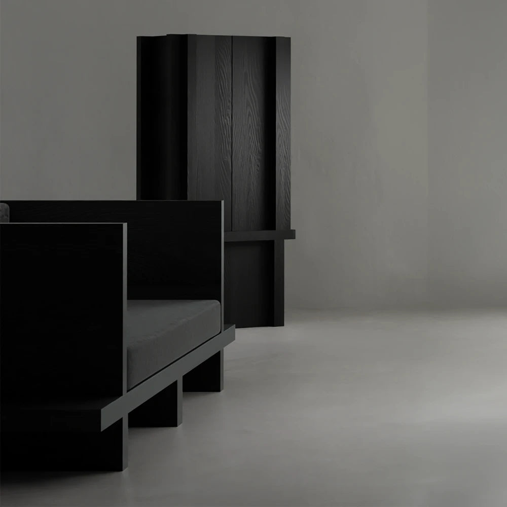 Three-quarter view of the Itooraba Cabinet by Sizar Alexis, highlighting its vertical proportions, black pine grain and projecting horizontal frame.