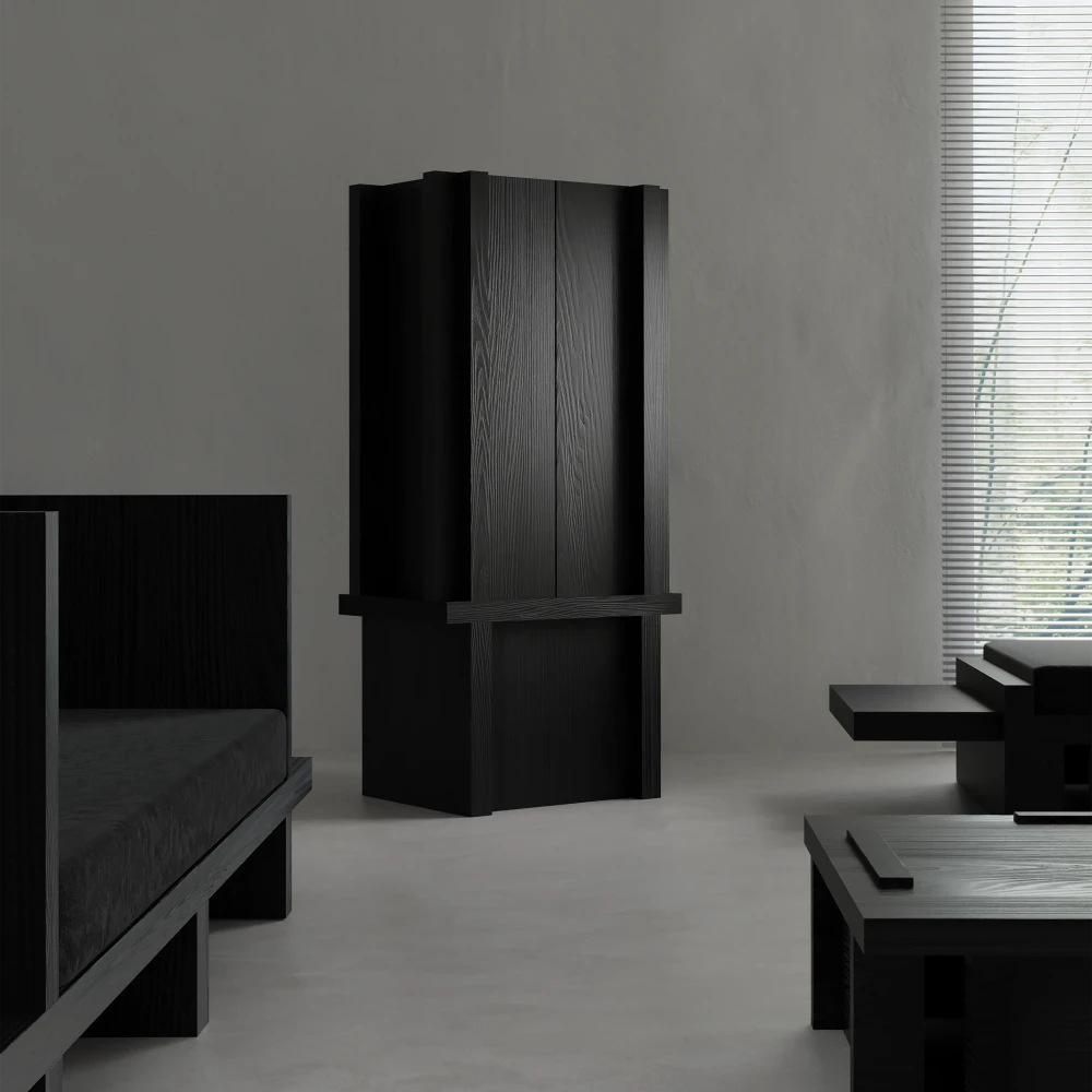 Itooraba Cabinet by Sizar Alexis presented among coordinating furniture, emphasizing its tall geometric silhouette and black solid pine construction.