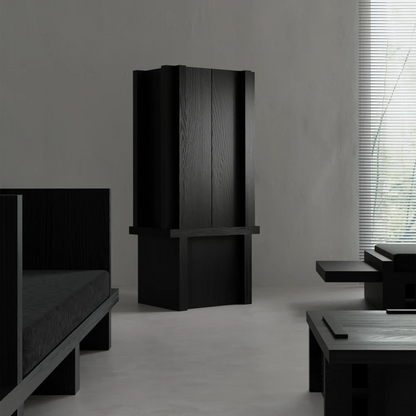 Itooraba Cabinet by Sizar Alexis presented among coordinating furniture, emphasizing its tall geometric silhouette and black solid pine construction.