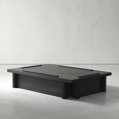 Three-quarter view of the Itooraba Coffee Table by Sizar Alexis, highlighting its low black pine structure and raised linear tabletop details.