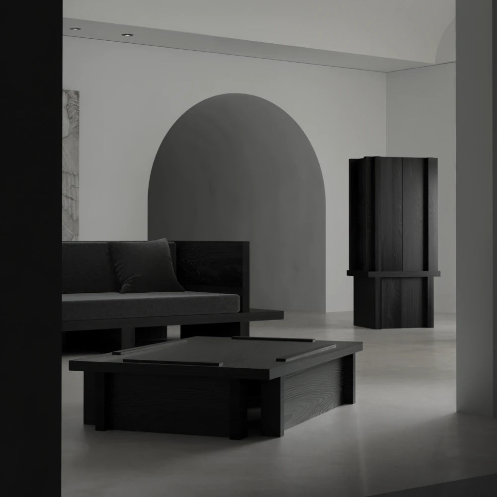 Front view of the Itooraba Coffee Table by Sizar Alexis, displayed with the matching sofa and cabinet in an architectural interior.
