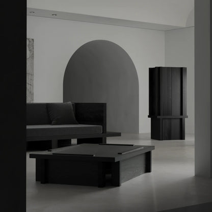Front view of the Itooraba Coffee Table by Sizar Alexis, displayed with the matching sofa and cabinet in an architectural interior.