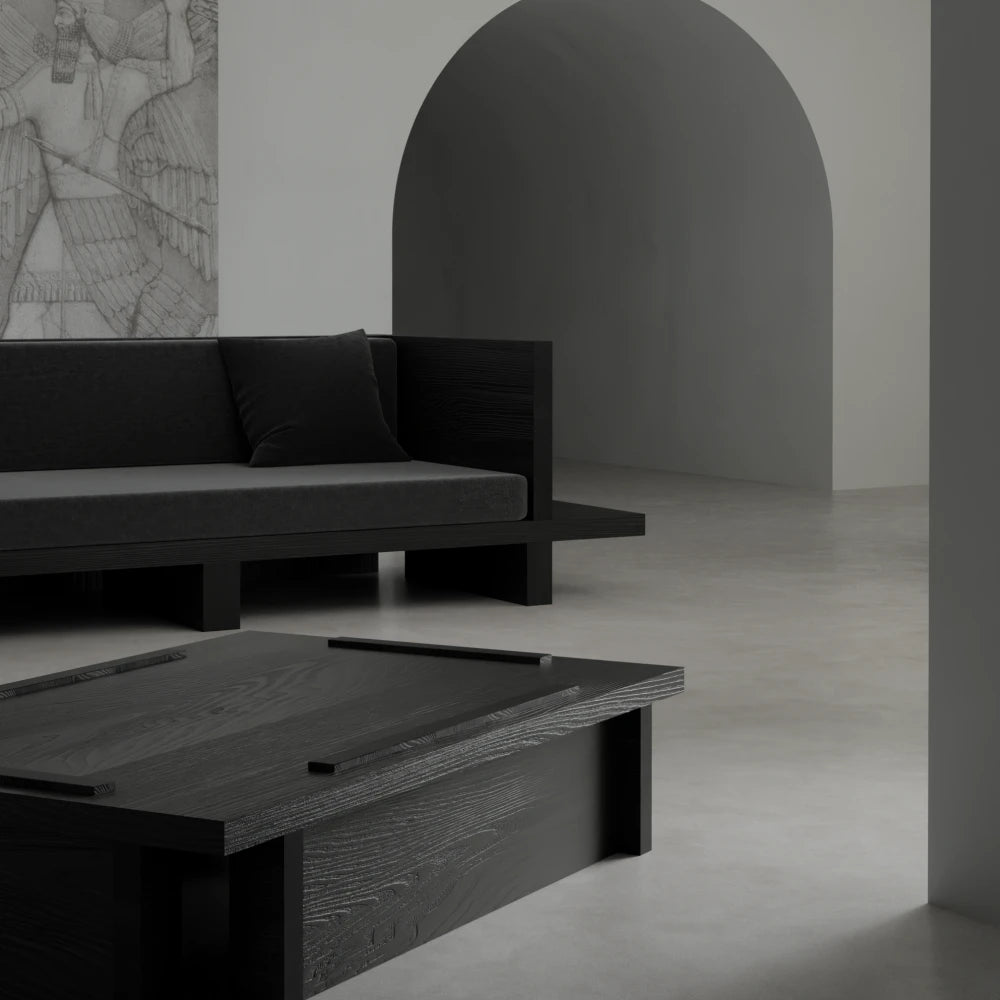 Close-up of the Itooraba Coffee Table by Sizar Alexis, revealing its pronounced black pine grain, layered top and geometric base.