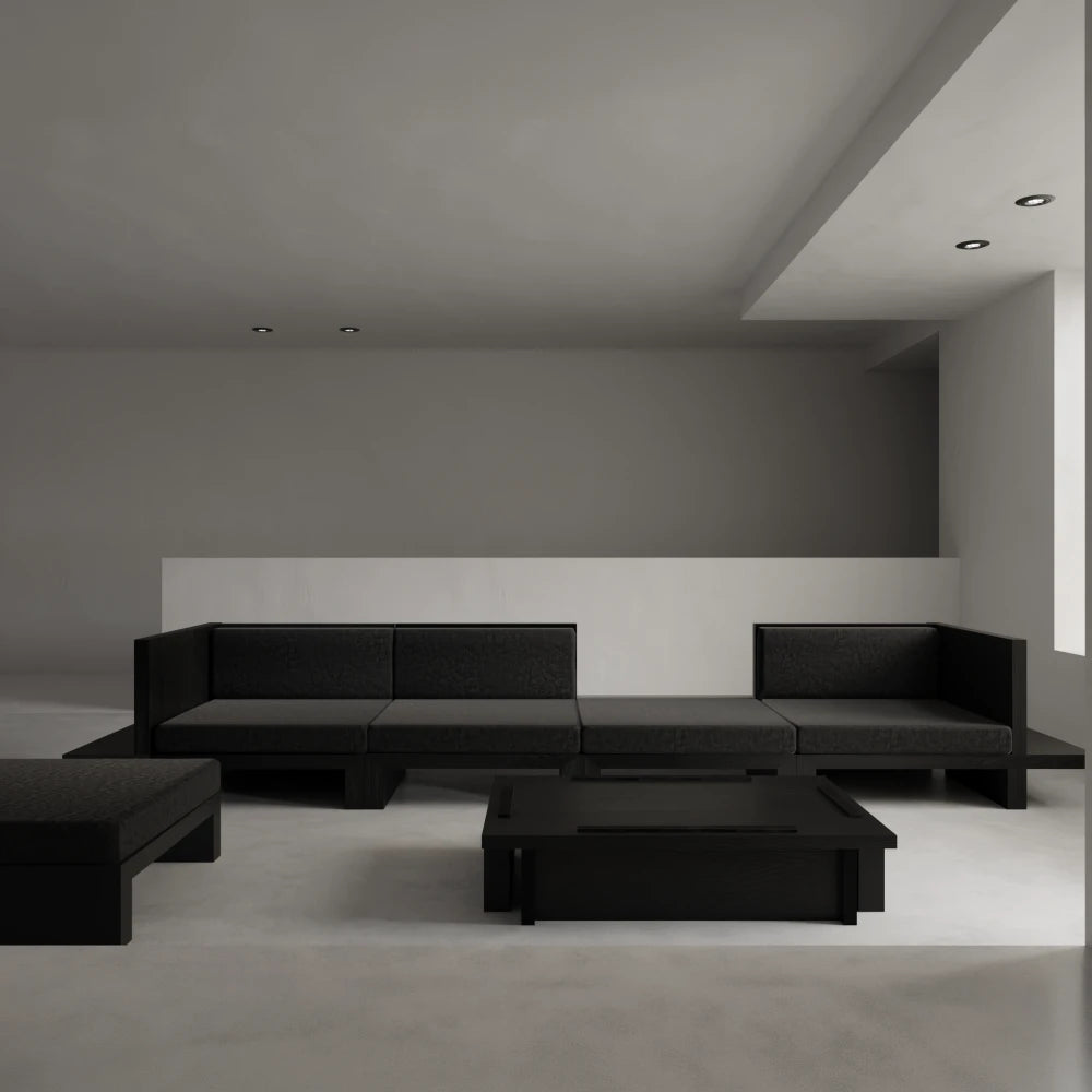 Itooraba Modular Sofa by Sizar Alexis arranged as a large sectional with dark upholstery and geometric black pine platforms.
