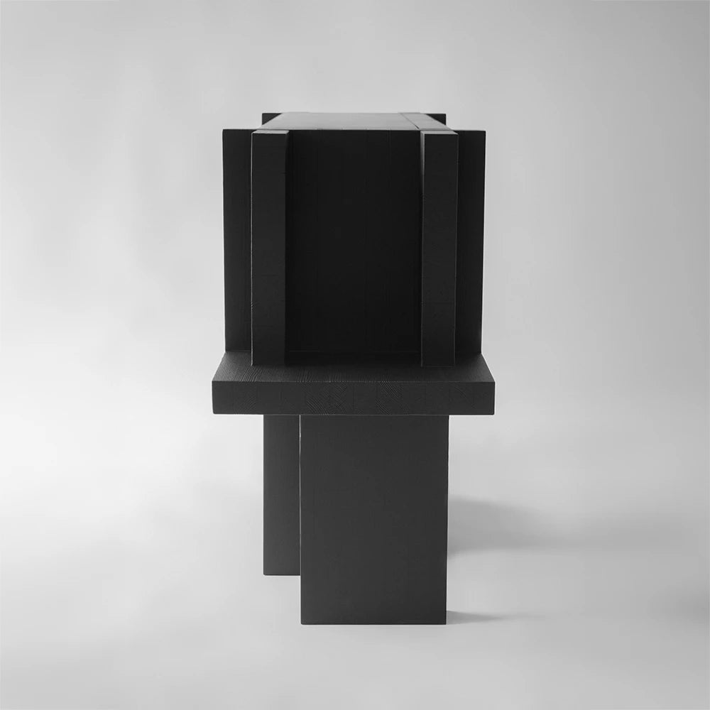 Side view of the Itooraba Sideboard Black by Sizar Alexis, revealing its layered geometric construction and substantial vertical supports.