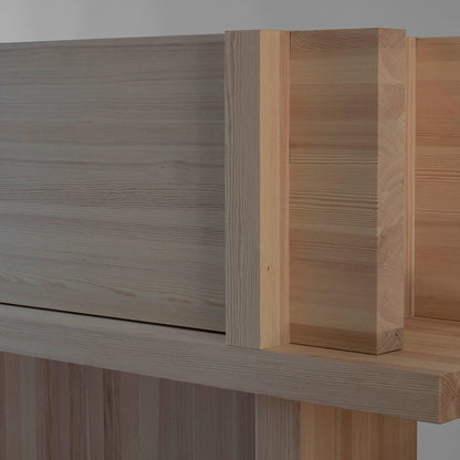 Close-up of the Itooraba Sideboard Natural by Sizar Alexis, highlighting its projecting door, Swedish pine grain and geometric construction.