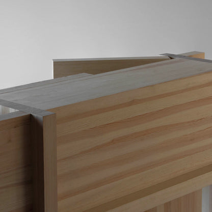 Angled detail of the Itooraba Sideboard Natural by Sizar Alexis, showing layered pine panels, intersecting planes and continuous natural grain.