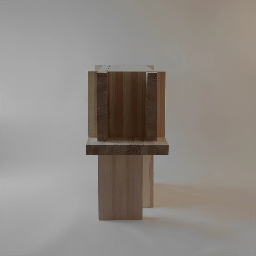 Side view of the Itooraba Sideboard Natural by Sizar Alexis, emphasizing its deep cabinet body, horizontal shelf and substantial vertical supports.