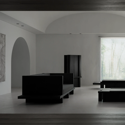 Rear view of the Itooraba Sofa by Sizar Alexis within a minimalist interior furnished with coordinating pieces from the collection.
