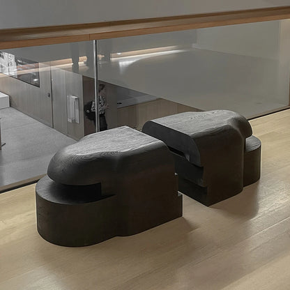 Lahmu Large Console Black by Sizar Alexis displayed as two separate modules in a contemporary gallery interior.v